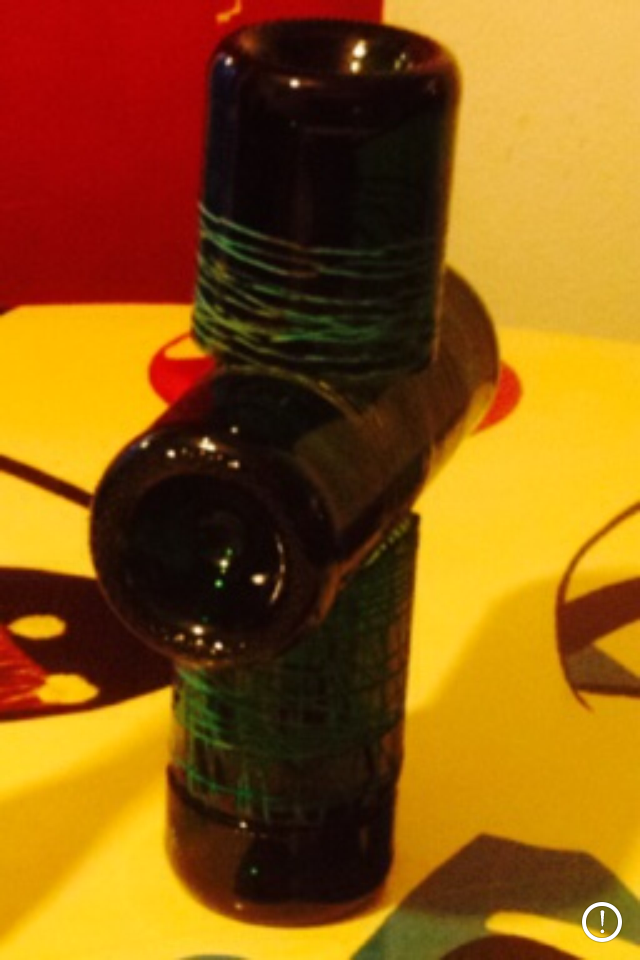 Edward Daniels  Cross made out of wine bottles